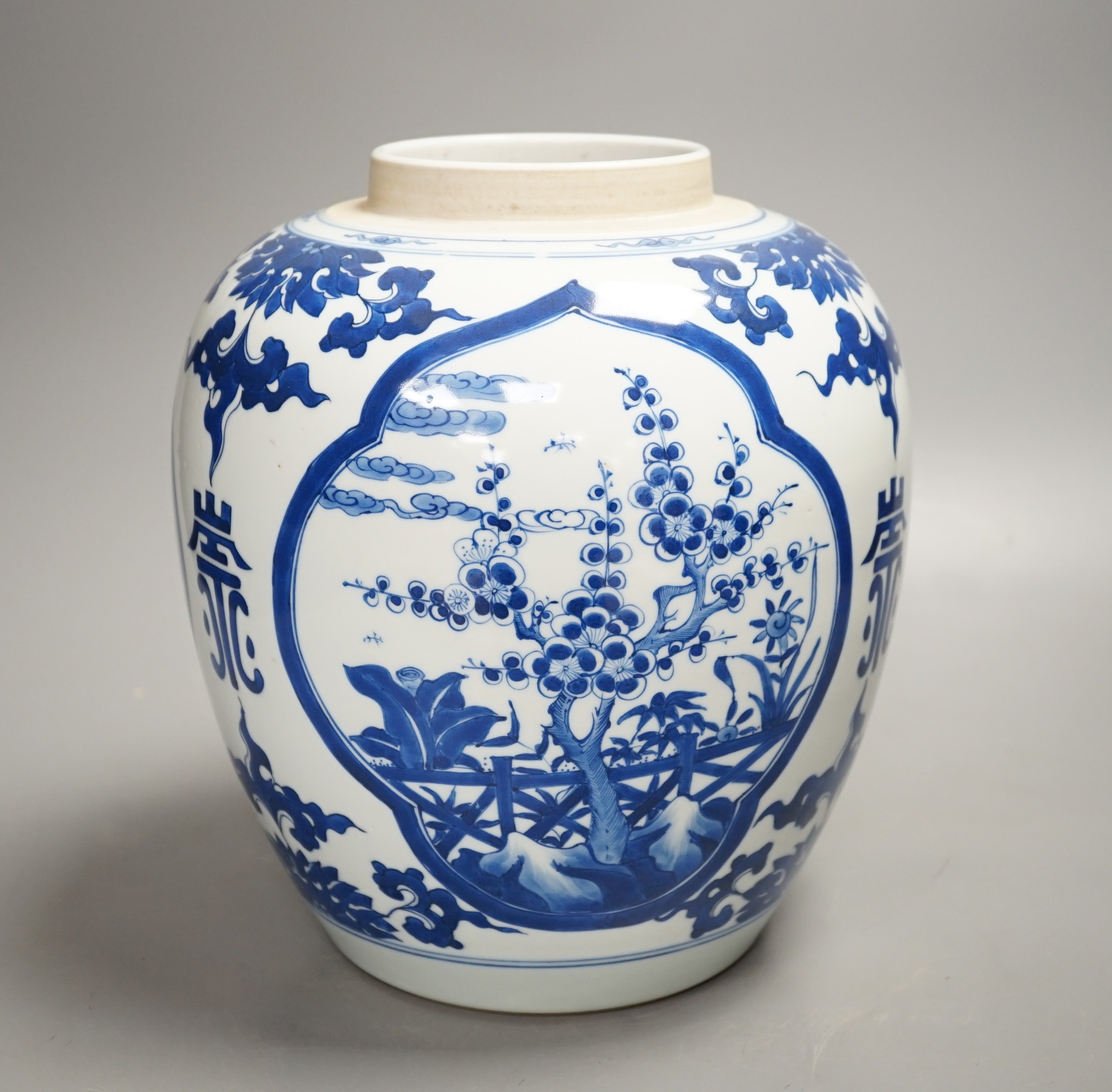 A Chinese blue and white jar, lacking cover 23cm